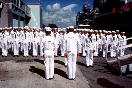 Sailors of USS Pharris (FF-1094) standing at attention during change of command ceremony 1989 Port Everglades DN-ST-90-05527