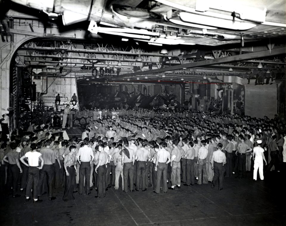 Sailors in the hangar of USS Enterprise (CV-6), 25 December 1943 (80-G-207823)