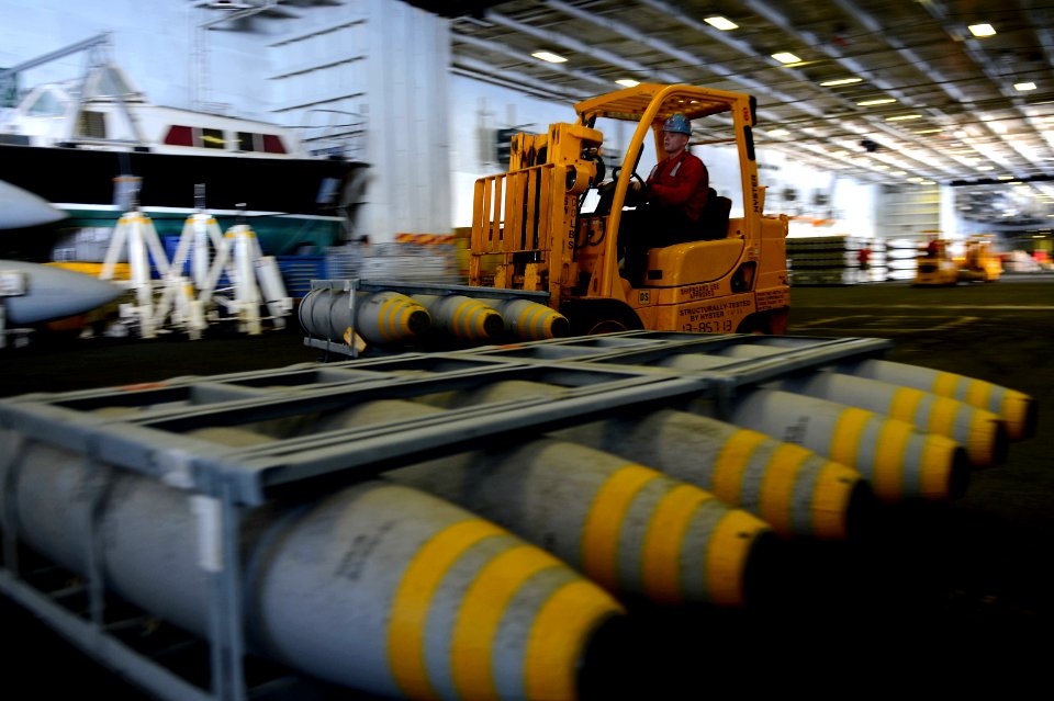 Sailors offload ordnance. (8671750621)