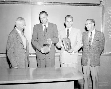 Safety awards. Left to right- Donald Cooksey, Glenn Seaborg, M. Leavitt, and Carroll Winterstein. Photograph taken September 22, 1955 - NARA 22118428