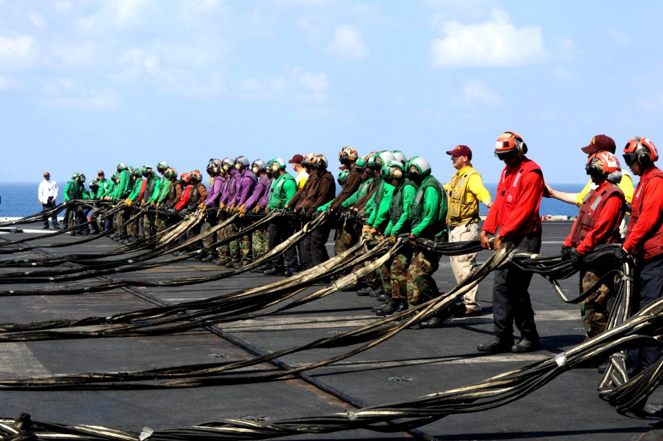 Sailors prepare an emergency barricade during a drill. (8599730011)