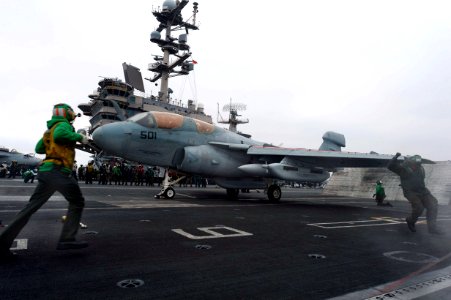 Sailors prepare to launch an aircraft at sea. (8693197018)