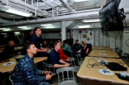 Sailors participate in a video game tournament