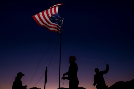 Sailors raise the American Flag. (8476432658) photo