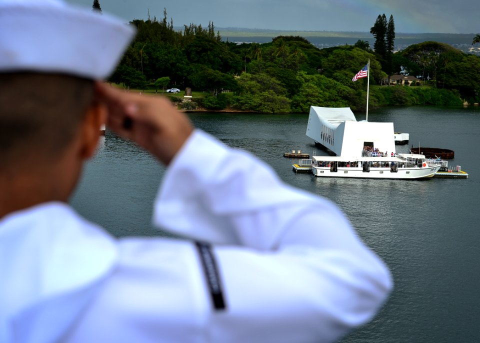 Sailors render honors as their ship passes the USS Arizona Memorial. (38626581956)
