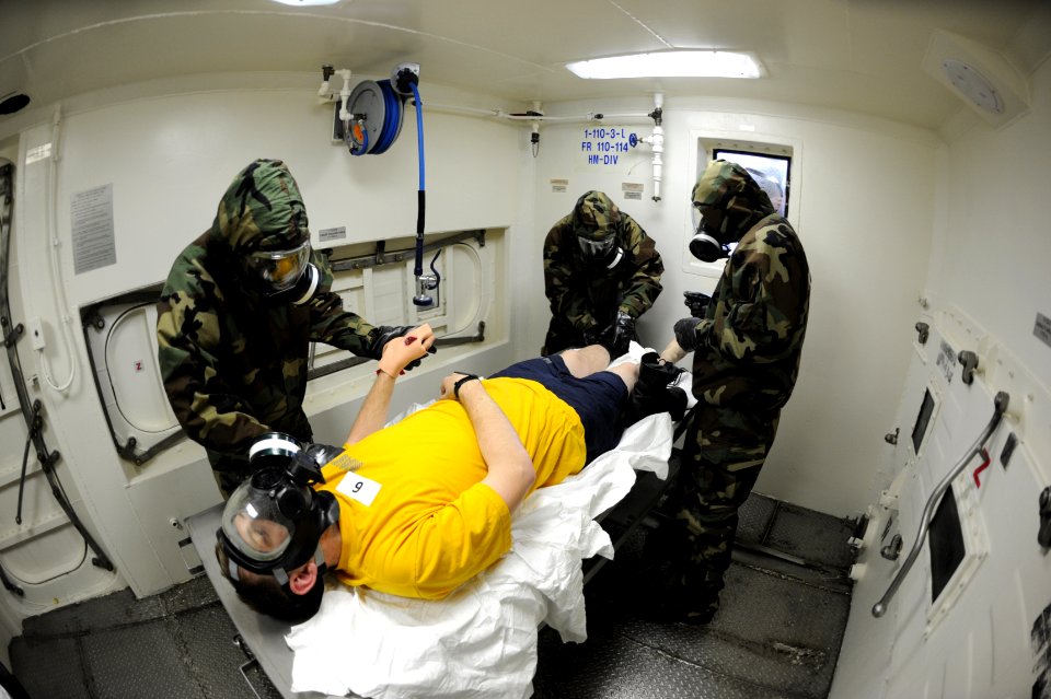 Sailors practice a decontamination station aboard USS San Diego. (8489342864)