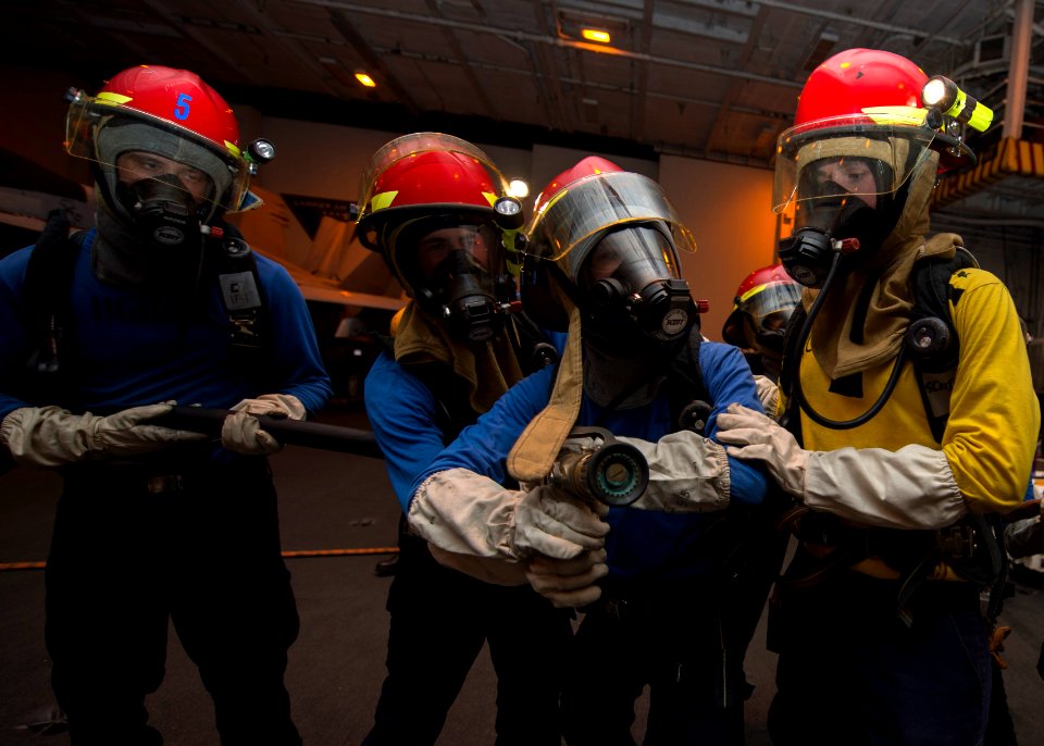 Sailors practice firefighting at sea. (8599728923)