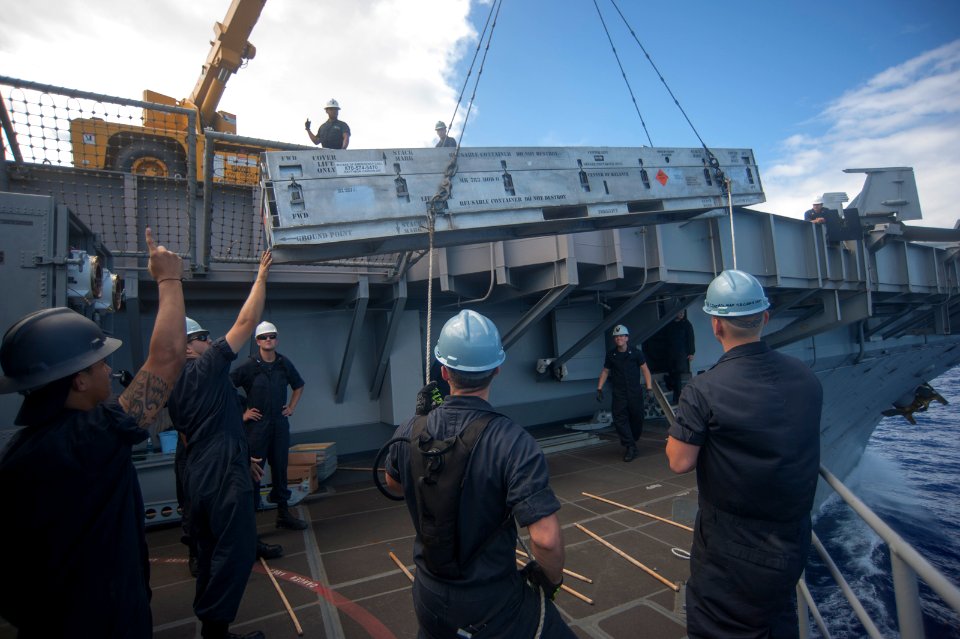 Sailors prep ESSM for launch 140905-N-TP834-588