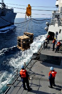 Sailors receive supplies during a replenishment-at-sea. (8243540319)