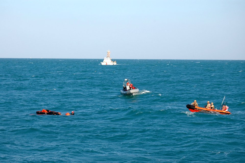 Sailors rescue an Iranian mariner.