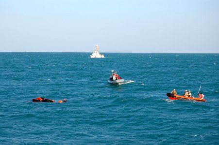 Sailors rescue an Iranian mariner.