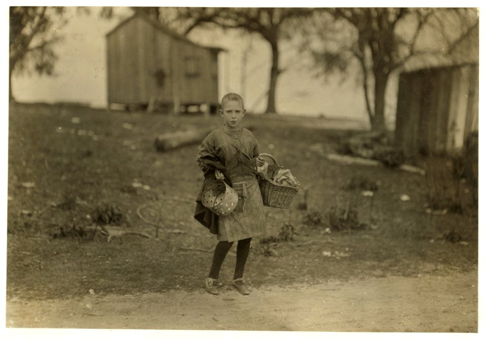 Sadie Kelly, 11 years old, Picks shrimp for the Peerless Oyster Co. Picked 7 pots yesterday, 5 pots today at 5 cents. Picked last year. LOC nclc.00905