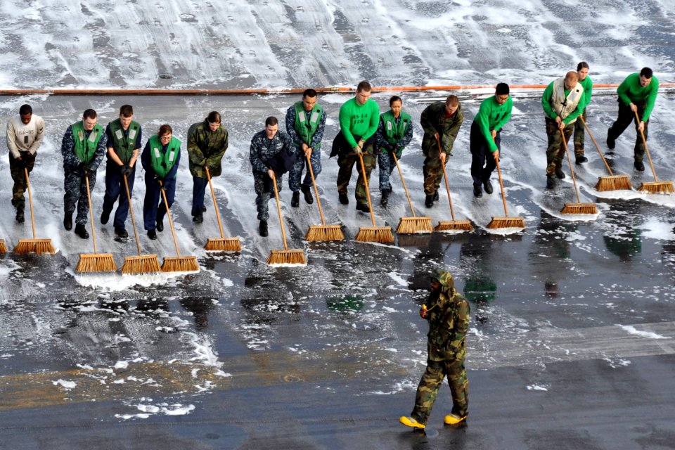 Sailors scrub the flight deck. (8203282828)