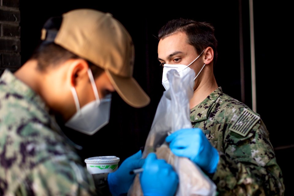 Sailors take care of quarantined shipmates from USS Kidd 200511-N-VN584-1114 (49913680472)