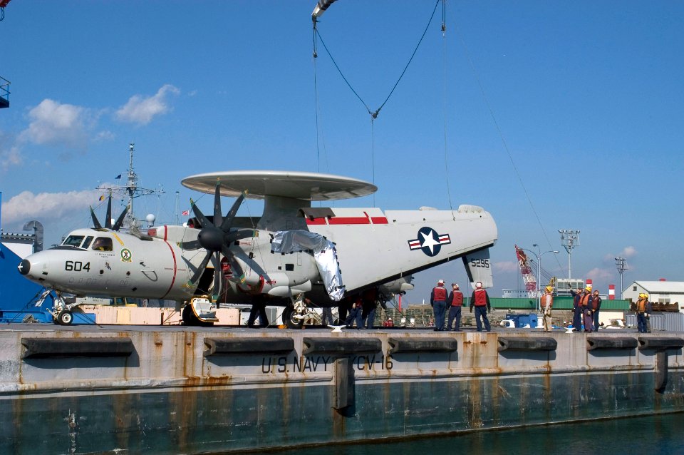 Sailors and Japanese contractors work together aboard USS Kitty Hawk DVIDS68255