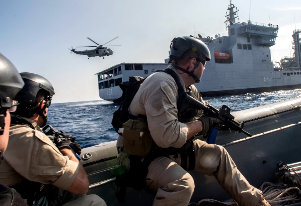 Sailors assigned to Surface Warfare Mission Package, Detachment 4, embarked aboard the USS Fort Worth train with the Indian Navy in an 11-meter rigid hull inflatable boat during a visit, board, search and seizure drill