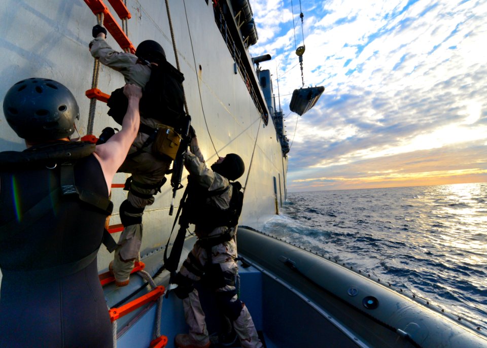 Sailors board a RHIB from USS Carter Hall. (8470061539)