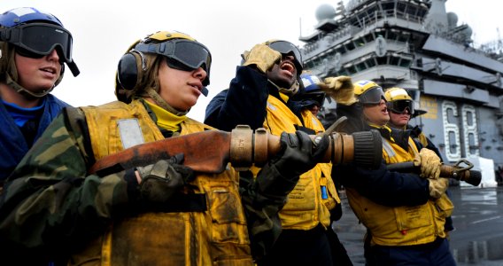 Sailors conduct a firefighting drill. (8539526444)