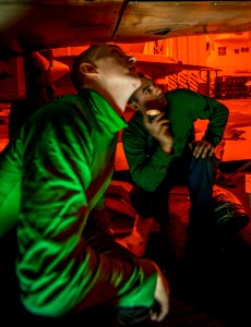 Sailors conduct aircraft maintenance aboard USS Carl Vinson 150216-N-TP834-324