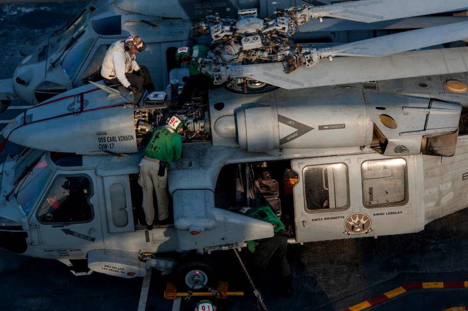 Sailors conduct Seahawk maintenance aboard USS Carl Vinson 141028-N-TP834-093