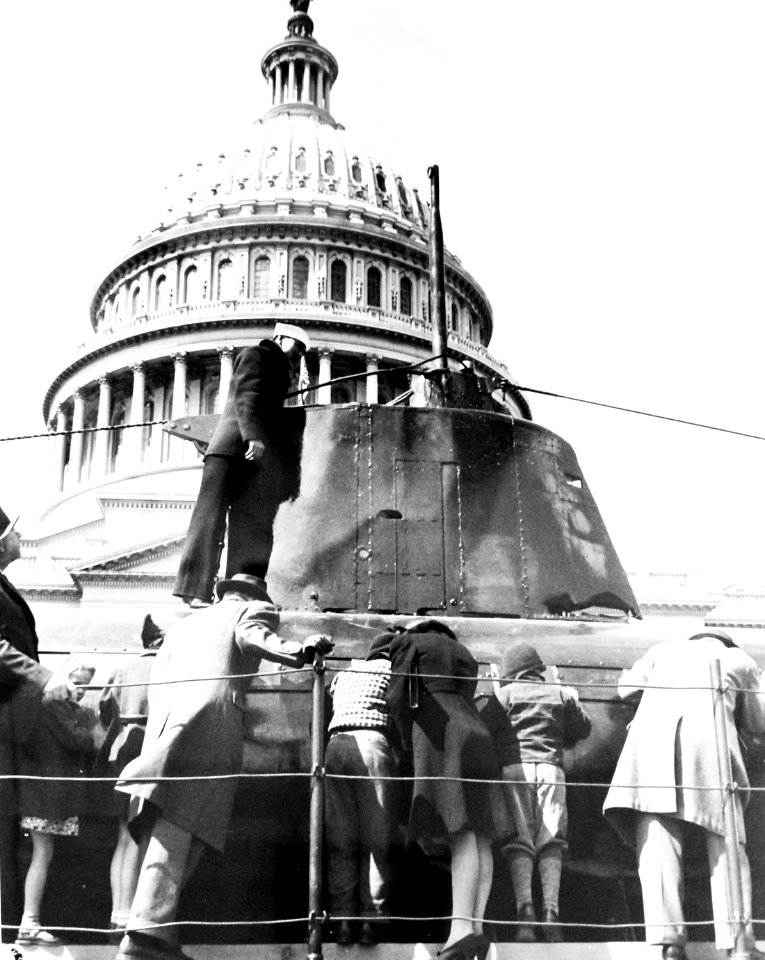 Sailor next to Japanese submarine conning tower of HA-19 at the U.S. Capitol (36865947223)
