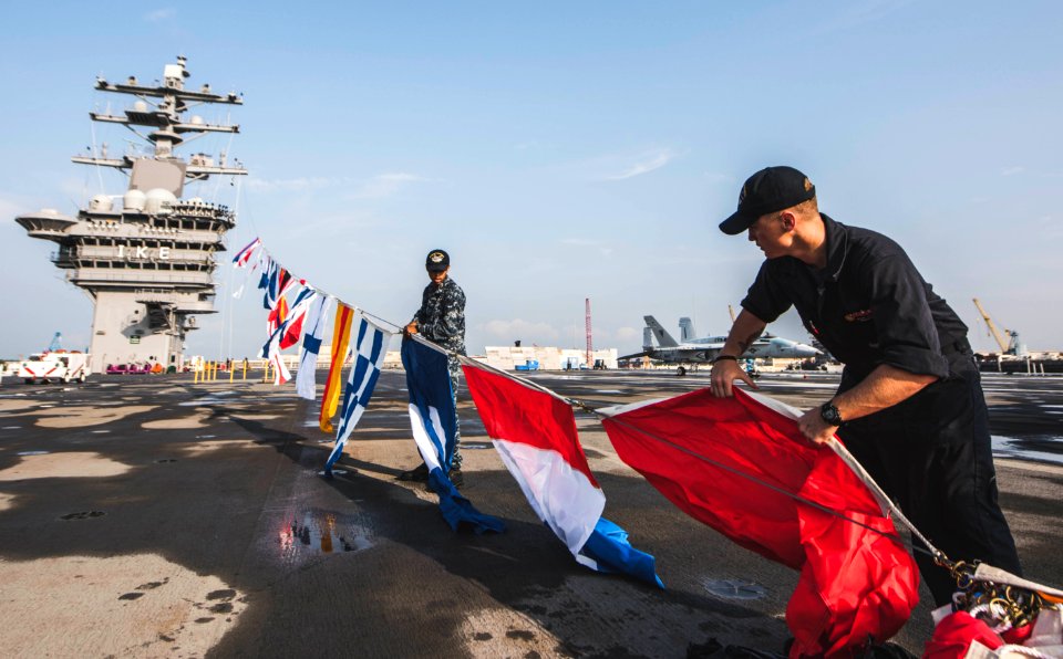 Sailors dress USS Dwight D. Eisenhower. (19526939785)