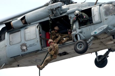 Sailors fast-rope from an MH-60S Sea Hawk helicopter. (18058017963)