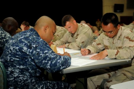 Sailors from Naval Station Guantanamo Bay and Joint Task Force Guantanamo take the Navy-wide first class petty officer advancement examination DVIDS374081