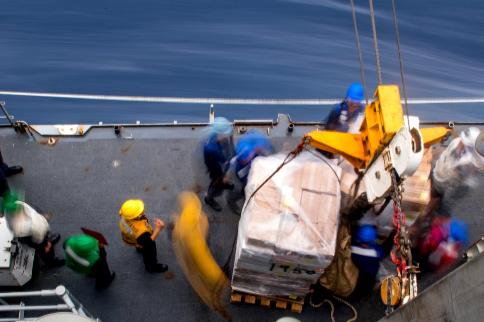Sailors aboard the Ticonderoga-class guided-missile cruiser USS Princeton (CG 59) conduct a replenishment-at-sea during Malabar 2017