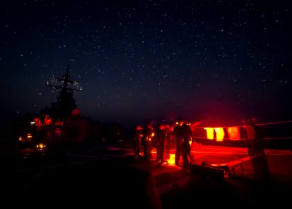 Sailors aboard USS Ross conduct a live-fire exercise. (19363754420)