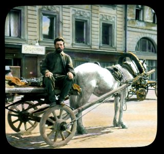 Saint Petersburg street scene, man with a horse-drawn cart