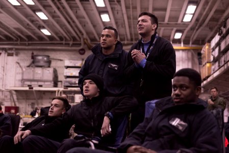Sailors and Marines watch a screening of the Super Bowl in the hangar bay of amphibious assault ship USS Bonhomme Richard (LHD 6) (32369347580) photo