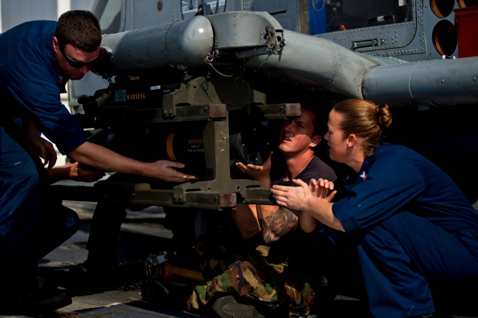 Sailors arm a Sea Hawk helicopter. (8613442724)