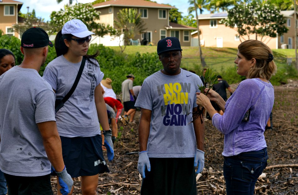 Sailors assist in a cleanup at the ancient fishpond, Loko Pa'aiau, on Oahu 150718-N-GI544-082