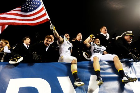 Sailors celebrate Navy's victory over Army.