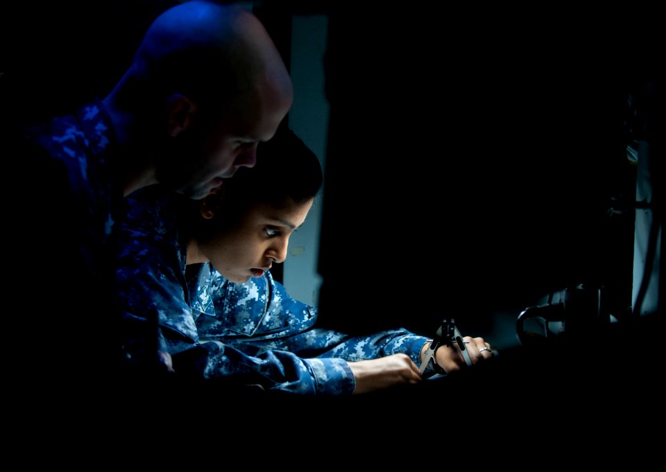 Sailors chart the position of USS Carl Vinson at sea. (8448063690)