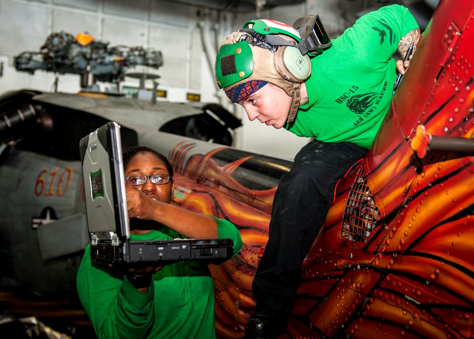 Sailors conduct MH-60S Seahawk maintenance aboard USS Carl Vinson 150304-N-FT110-123