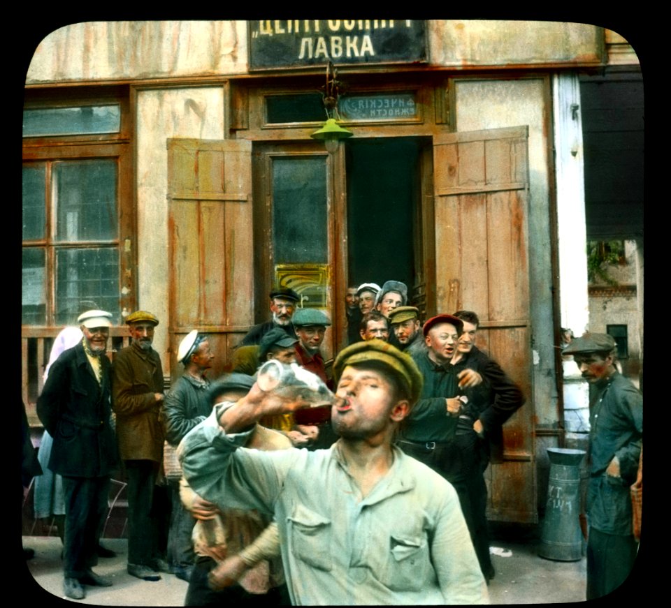 Saint Petersburg. Nevsky Prospect men drinking outside a store