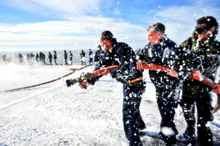 Sailors participate in a flight deck washdown. (8446976595)