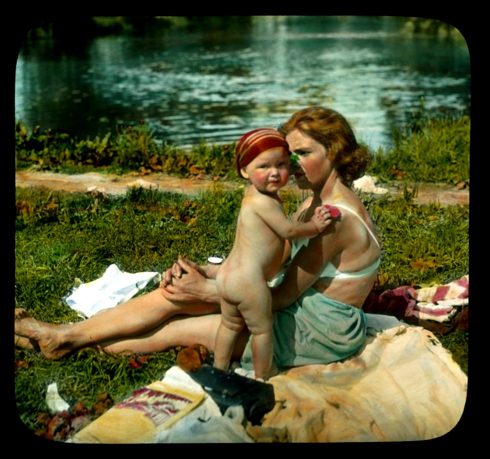 Saint Petersburg. Yelagin Island woman and child on the beach