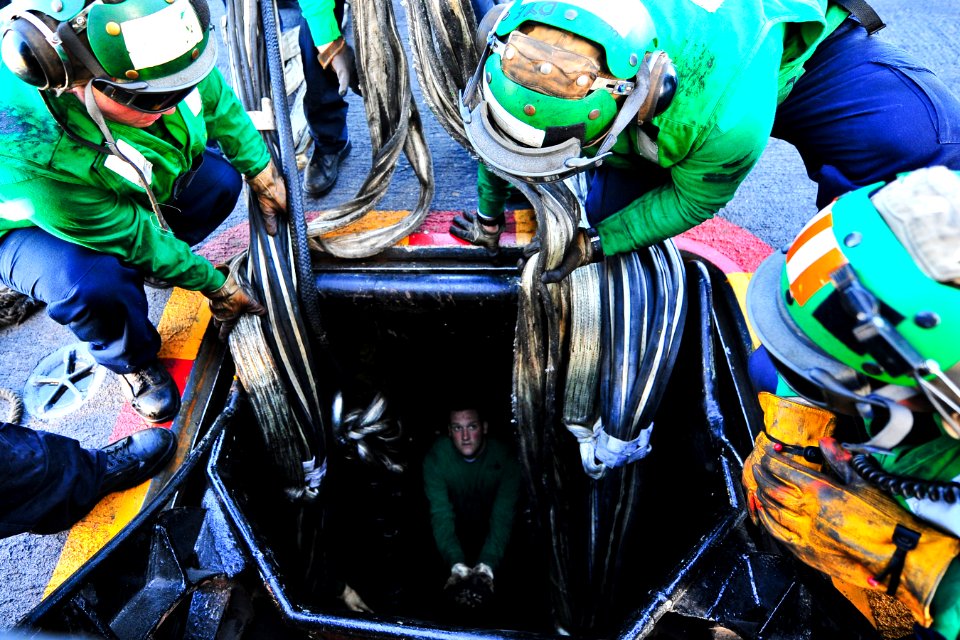 Sailors participate in flight deck barricade drills. (8467526489)
