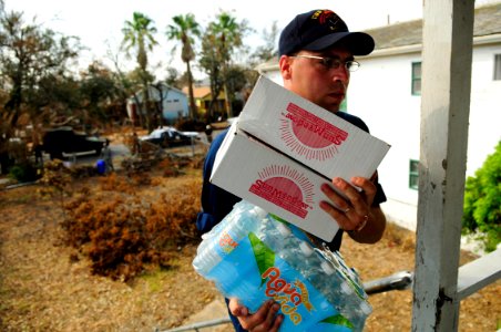 Sailors distribute basic needs during food convoy in Galveston DVIDS117371