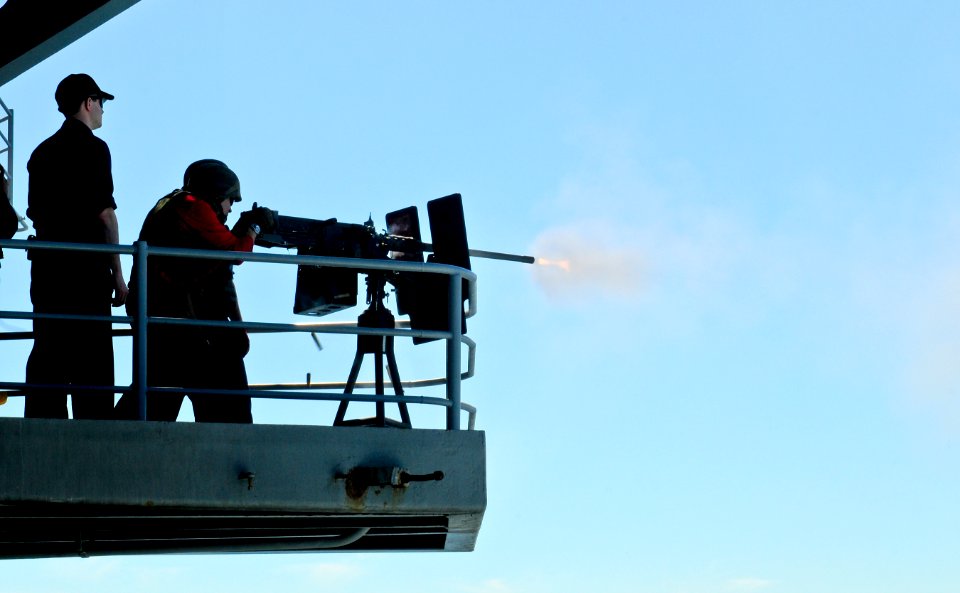 Sailors fire a .50-caliber aboard USS Carl Vinson. (8497231137)