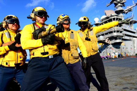 Sailors practice fire fighting at sea. (8435775876)