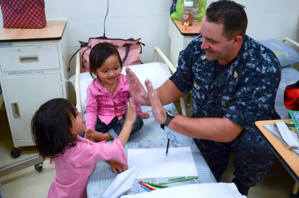 Sailors from USS Frank Cable volunteer at a hospital. (8531845918)