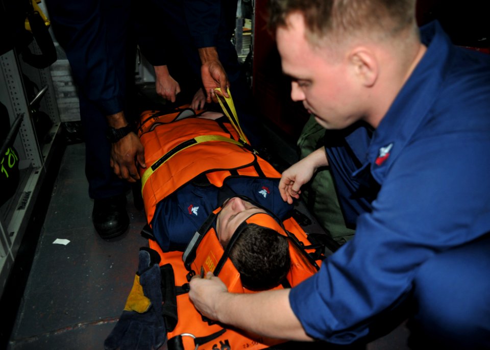 Sailors practice stretcher procedures at sea. (8427152026)