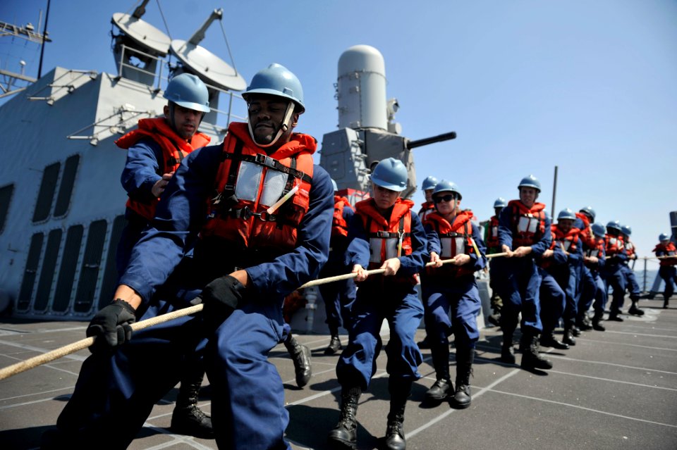 Sailors handle a line during a replenishment-at-sea. (8243539823)