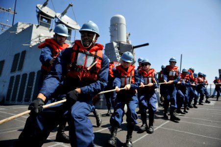 Sailors handle a line during a replenishment-at-sea. (8243539823)
