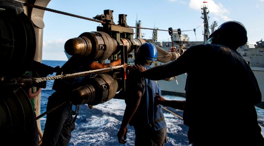 Sailors prepare to connect a fueling probe during a replenishment-at-sea. (38513333282)