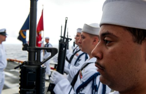 Sailors hold guns during burial-at-sea. (24873249038)